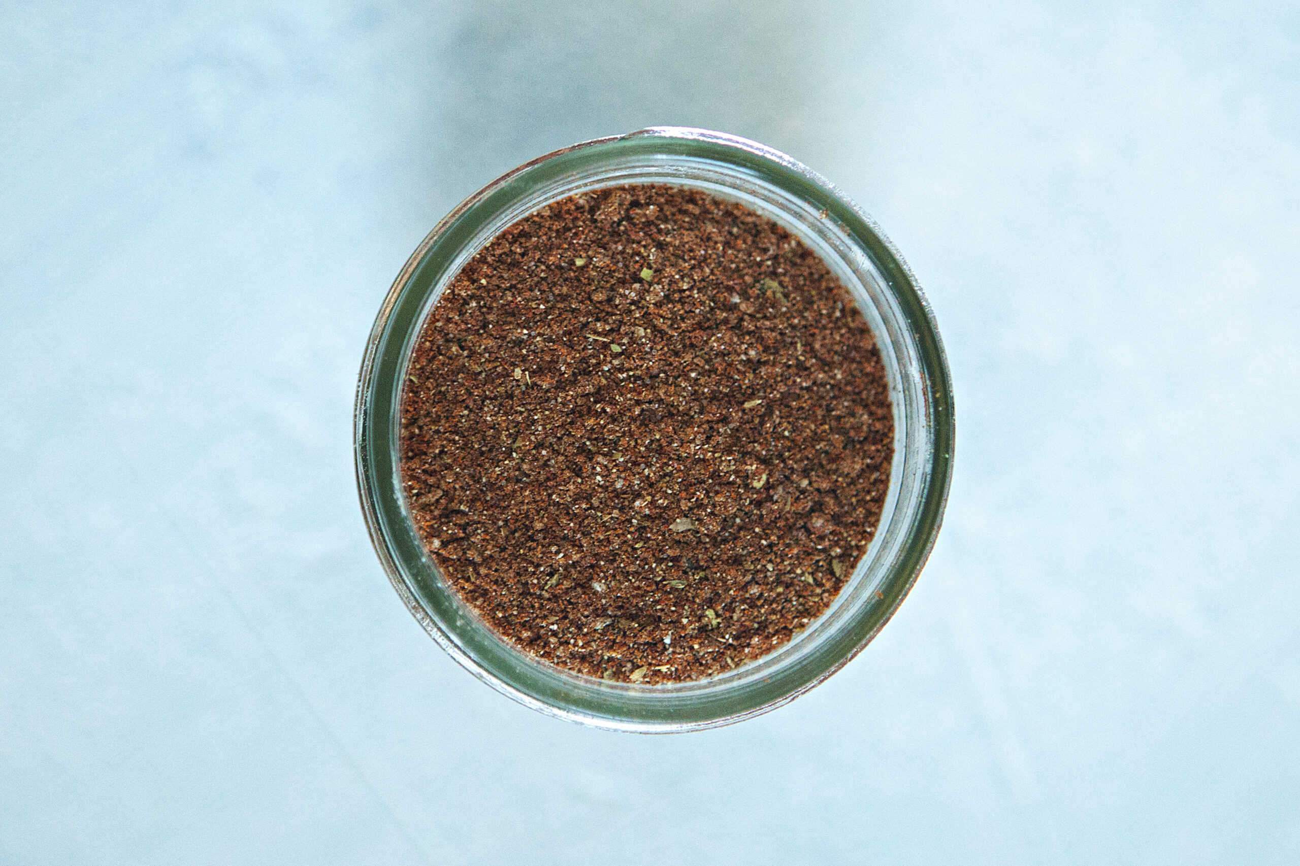 Homemade taco seasoning mix in a mason jar.